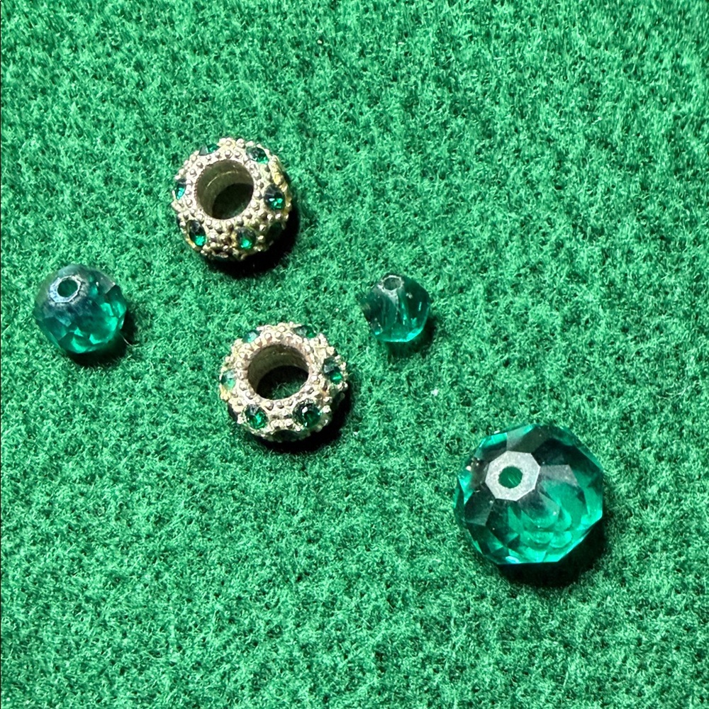 Emerald green beads and charms x5